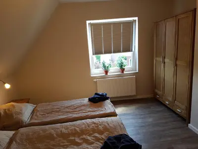Ein Bett oder Betten in einem Zimmer der Unterkunft Haus Weimann