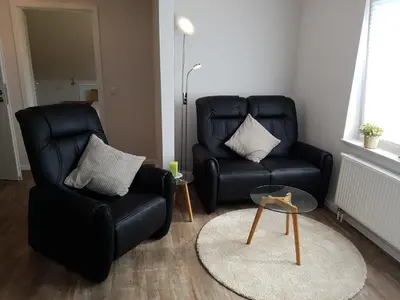 Ein Sitzbereich in der Unterkunft Haus Weimann
