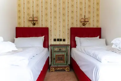 Ein Bett oder Betten in einem Zimmer der Unterkunft Hotel Appartement Landhaus Stutzi - Hotel Strandperle