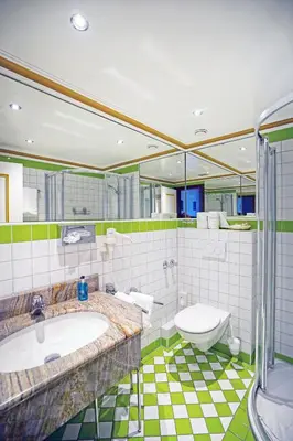 Ein Badezimmer in der Unterkunft Hotel Appartement Landhaus Stutzi - Hotel Strandperle