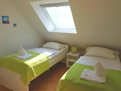 Ein Bett oder Betten in einem Zimmer der Unterkunft Ferienwohnung Nordwind