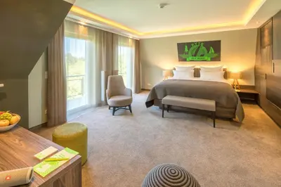 Ein Bett oder Betten in einem Zimmer der Unterkunft Pura Vida Hotel Cuxhaven