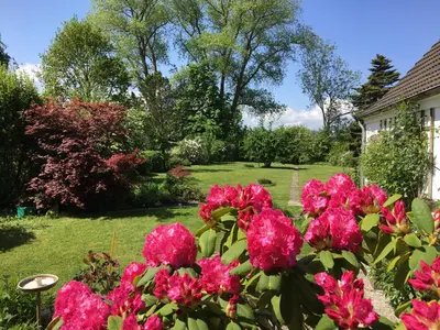 Ein Garten an der Unterkunft Ferienhaus Scholien