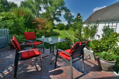 Ein Garten an der Unterkunft Ferienhaus Scholien