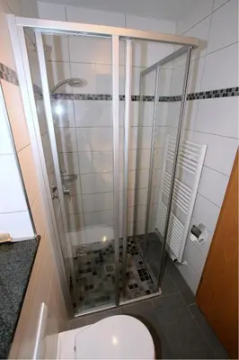 Ein Badezimmer in der Unterkunft Kugelbake