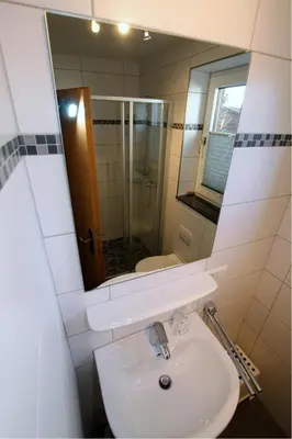 Ein Badezimmer in der Unterkunft Kugelbake
