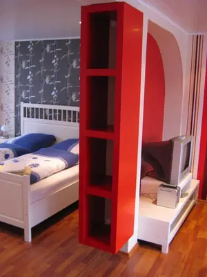 Ein Bett oder Betten in einem Zimmer der Unterkunft Die Lütte Krabbe