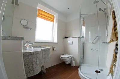 Ein Badezimmer in der Unterkunft Hotel Christiansen