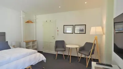 Ein Bett oder Betten in einem Zimmer der Unterkunft Westerstrasse Kajüten