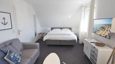 Ein Bett oder Betten in einem Zimmer der Unterkunft Westerstrasse Kajüten