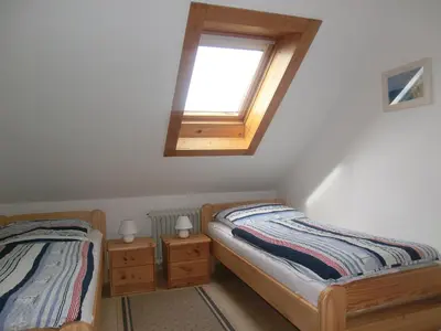 Ein Bett oder Betten in einem Zimmer der Unterkunft Haus Strandgut/2