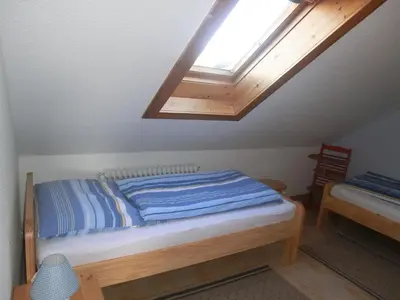 Ein Bett oder Betten in einem Zimmer der Unterkunft Haus Strandgut/2