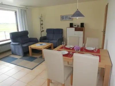 Ein Sitzbereich in der Unterkunft Haus Strandgut/1