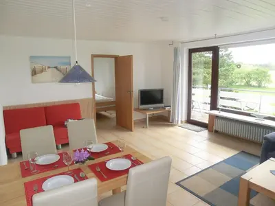 Ein Sitzbereich in der Unterkunft Haus Strandgut/1