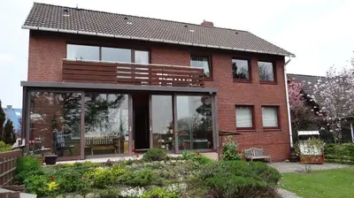 Ein Garten an der Unterkunft Haus Strandgut/1