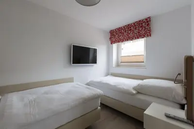 Ein Bett oder Betten in einem Zimmer der Unterkunft Strandhaus Christiansen