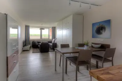 Ein Sitzbereich in der Unterkunft Strandhaus Christiansen