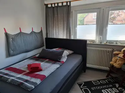 Ein Bett oder Betten in einem Zimmer der Unterkunft Am Kanal