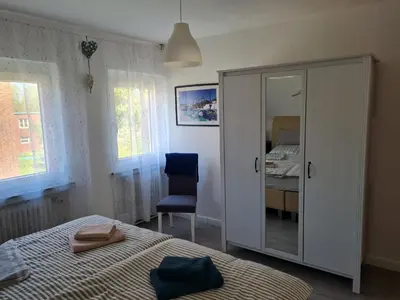 Ein Bett oder Betten in einem Zimmer der Unterkunft Am Kanal