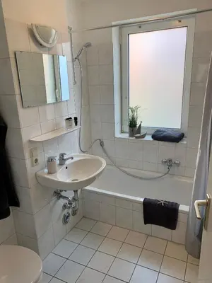 Ein Badezimmer in der Unterkunft Medemufer
