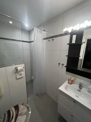 Ein Badezimmer in der Unterkunft Ferienhaus Mia, Urlaub mit Hund, eingezäunter Garten, Friedrichskoog-Spitze