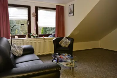 Ein Sitzbereich in der Unterkunft Ferienwohnung Hoyler