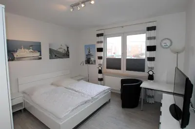 Ein Bett oder Betten in einem Zimmer der Unterkunft Elbe 1