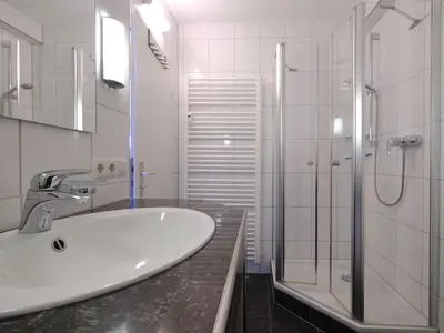 Ein Badezimmer in der Unterkunft Ferienwohnung 348 Haus Deichgraf