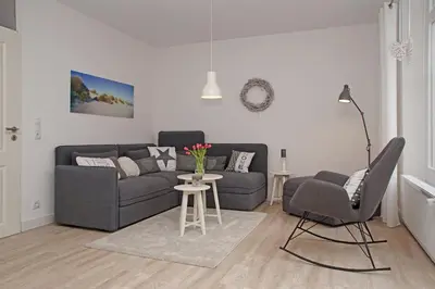 Ein Sitzbereich in der Unterkunft Strandläufer