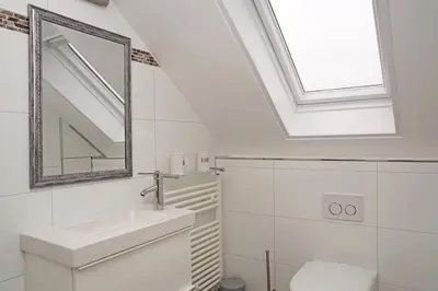 Ein Badezimmer in der Unterkunft Strandläufer
