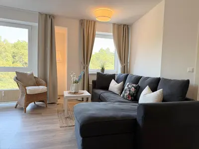 Ein Sitzbereich in der Unterkunft Ferienwohnung Nordseebrandung A3.3