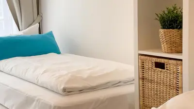 Ein Bett oder Betten in einem Zimmer der Unterkunft Ferienwohnung Nordseebrandung B3.1