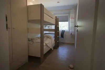 Ein Bett oder Betten in einem Zimmer der Unterkunft Hohe Geest Whg. 6