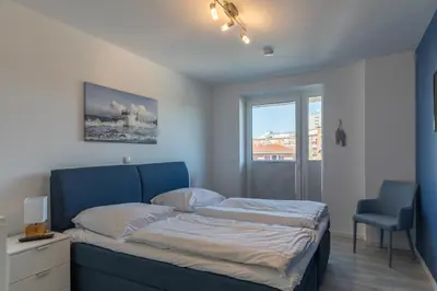 Ein Bett oder Betten in einem Zimmer der Unterkunft Quartier Hohe Geest - Wohnung Meerzeit