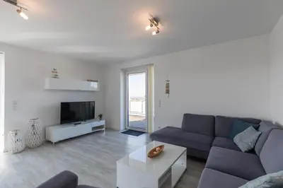 Ein Sitzbereich in der Unterkunft Quartier Hohe Geest - Wohnung Meerzeit