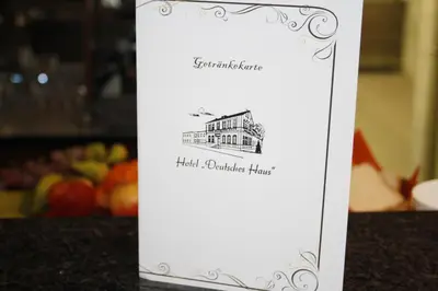 Ein Zertifikat, Auszeichnung, Logo oder anderes Dokument, das in der Unterkunft Hotel Deutsches Haus ausgestellt ist