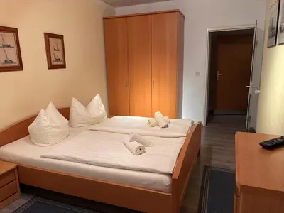 Ein Bett oder Betten in einem Zimmer der Unterkunft Hotel-Restaurant Nord Stuv