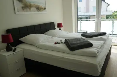 Ein Bett oder Betten in einem Zimmer der Unterkunft Ferienwohnung 'Hohe Geest Whg. 6'