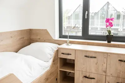 Ein Bett oder Betten in einem Zimmer der Unterkunft Strandnest
