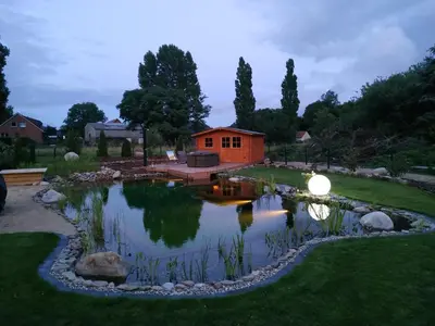 Ein Garten an der Unterkunft Gästequartier Schlummerkasten