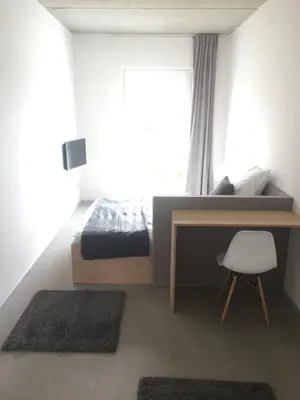 Ein Bett oder Betten in einem Zimmer der Unterkunft Designer Studio Geestland