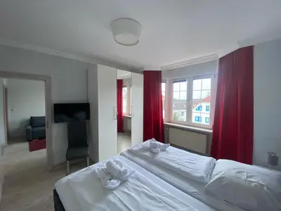 Ein Bett oder Betten in einem Zimmer der Unterkunft Haus Nordsee 06