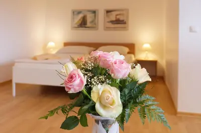 Ein Bett oder Betten in einem Zimmer der Unterkunft Frauenpreiß Ferienwohnungen