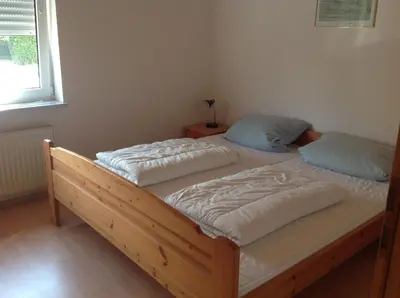 Ein Bett oder Betten in einem Zimmer der Unterkunft Ferienwohnungen Walter