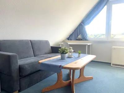 Ein Sitzbereich in der Unterkunft Ferienwohnung Hamburger Straße 7OG in Cuxhaven