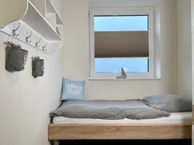 Ein Bett oder Betten in einem Zimmer der Unterkunft Quartier Hohe Geest 19