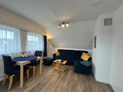 Ein Sitzbereich in der Unterkunft Apartmenthaus am Watt Büsum