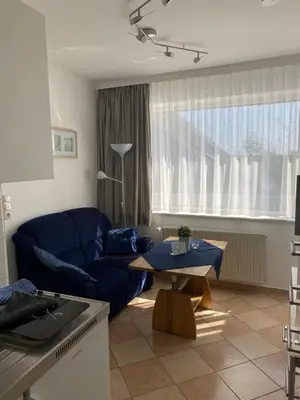 Ein Sitzbereich in der Unterkunft Apartmenthaus am Watt Büsum