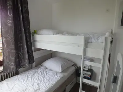 Ein Bett oder Betten in einem Zimmer der Unterkunft Watten-Blick 2