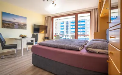 Ein Bett oder Betten in einem Zimmer der Unterkunft FeWo Büsum - Bella Mare - Nordseestraße 3